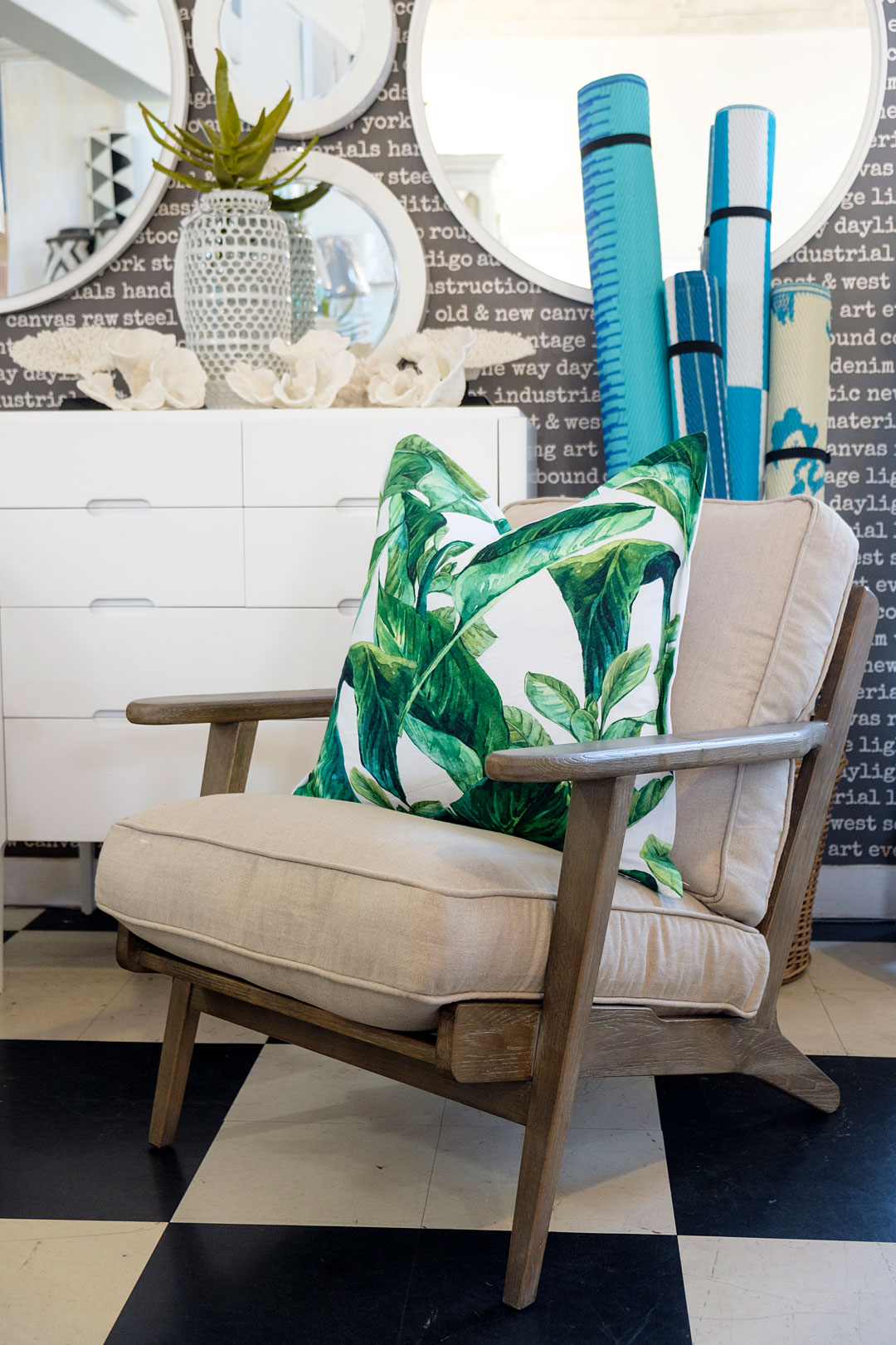 Linen chair with tropical scatter cushions
